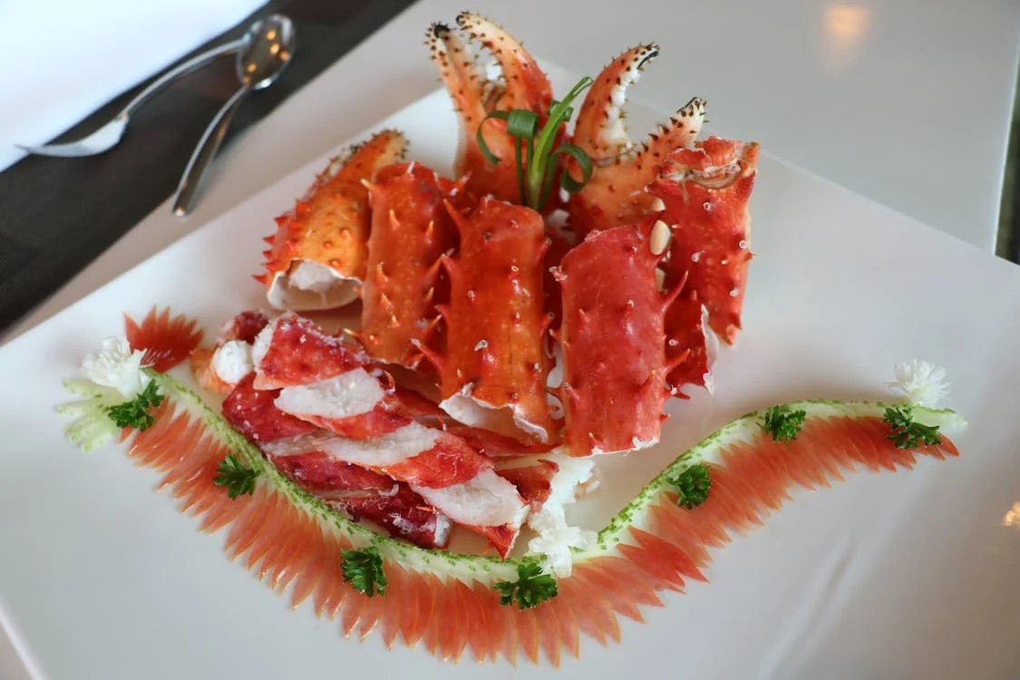 King crab legs arranged in an elegant tasting presentation